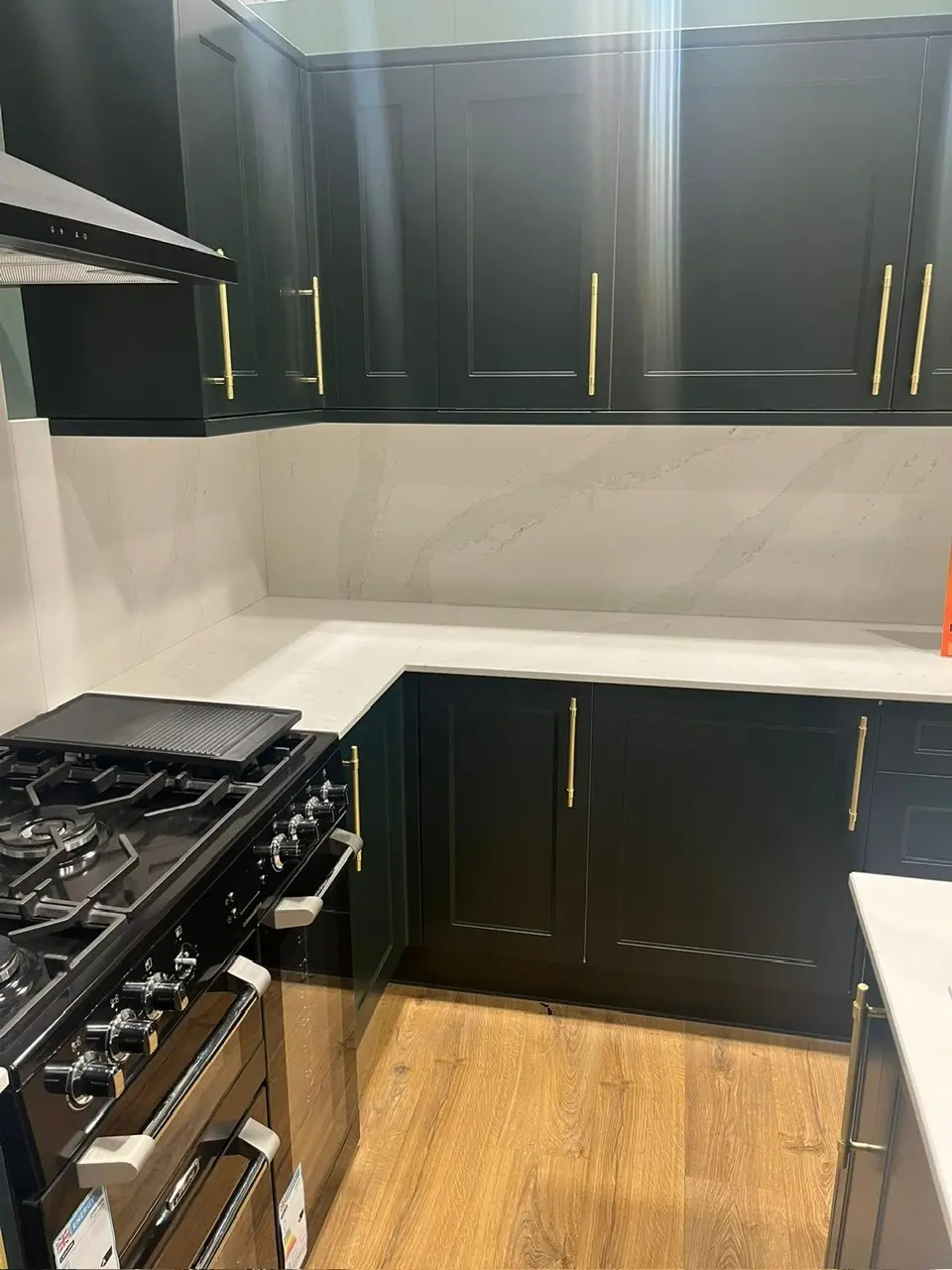 Completed green kitchen installation by T and T Contractors