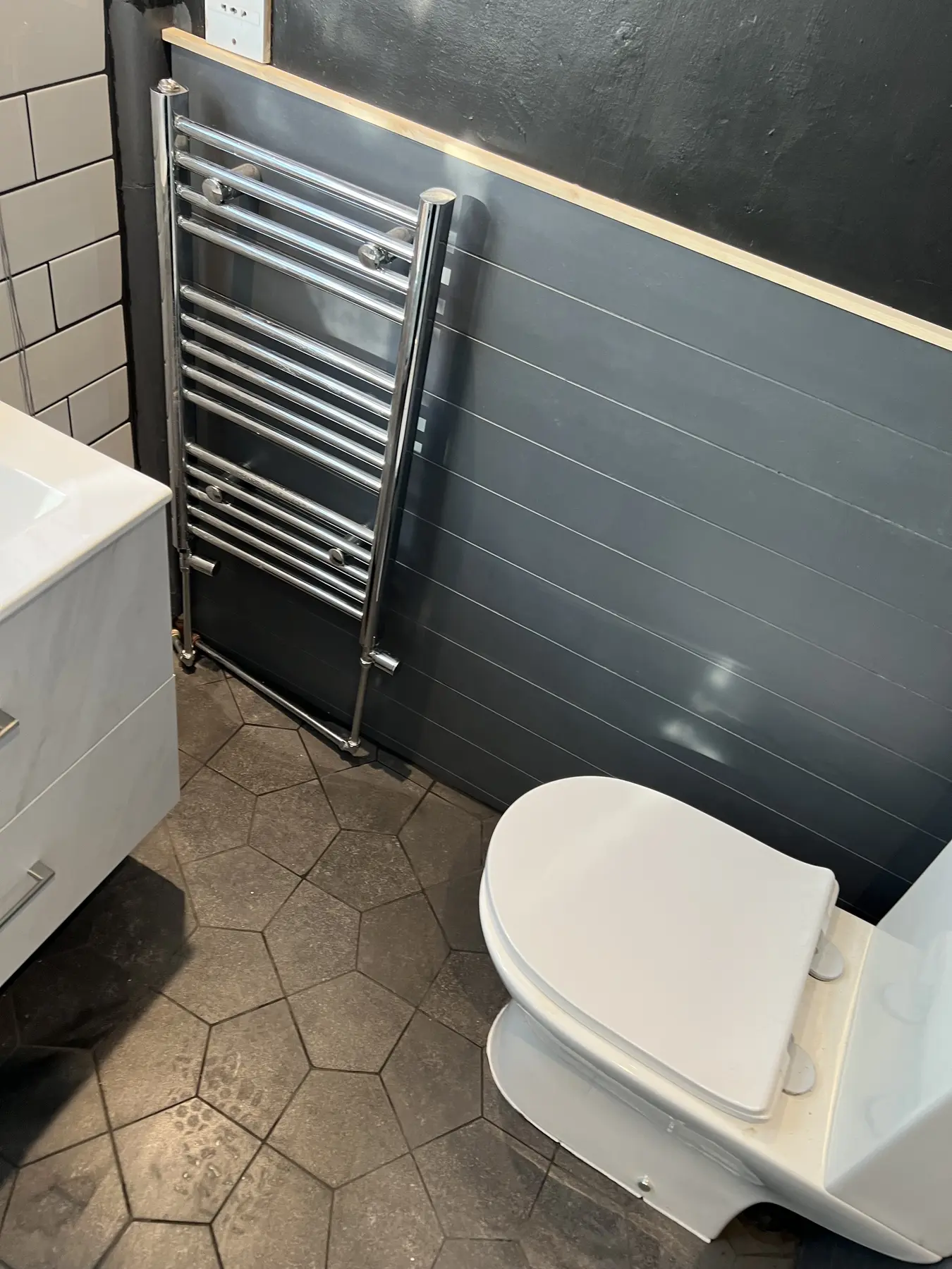 Modern bathroom with black radiator