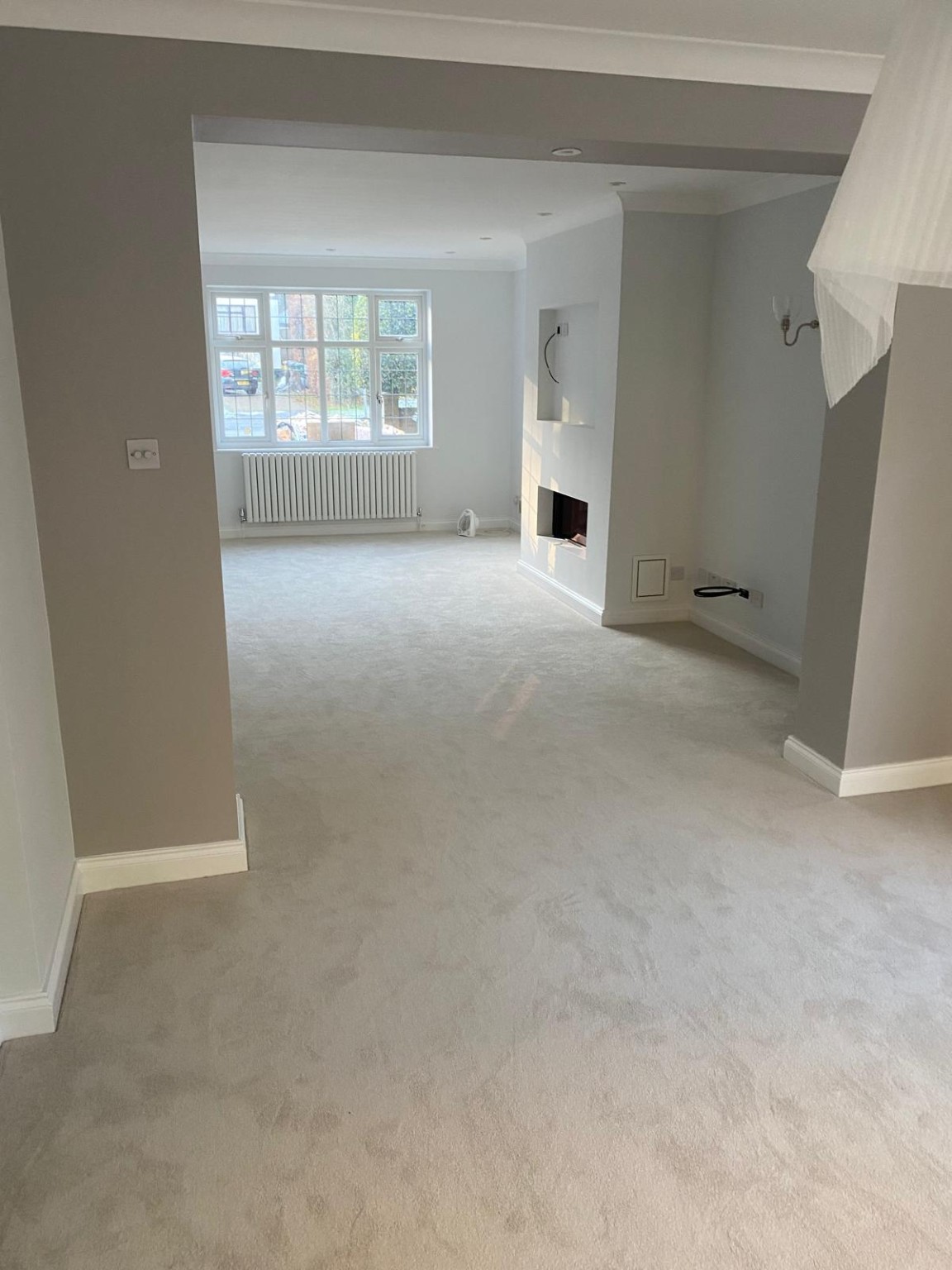 Completed open-plan living room property renovation by T and T Contractors