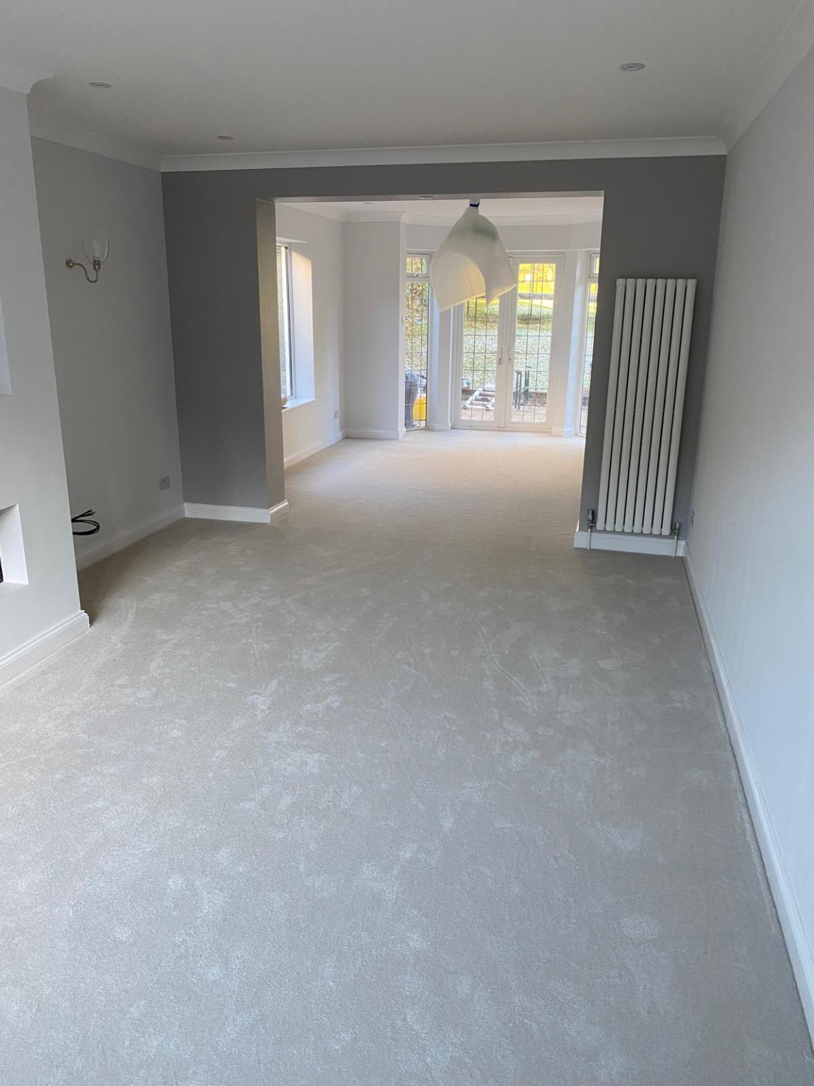 Completed living and dining room refurbishment by T and T Contractors
